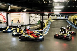 Racers take off at Infinity Racing’s newly launched indoor multi-level Go-Kart track in HCM City, the first of its kind in Vietnam (Photo: VNA)