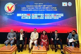 Representatives of Vietnamese businesses participate in a discussion session at a seminar held in HCM City on March 25 (Photo: VNA)