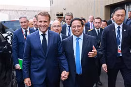 Prime Minister Pham Minh Chinh (second, right) meets with French President Emmanuel Macron on the sidelines of the 3rd UN Ocean Conference (UNOC3) in Nice, France on June 9. (Photo: VNA)
