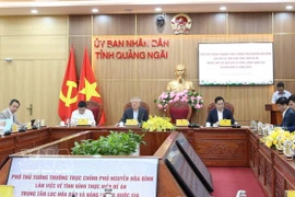 At the working session between Standing Deputy Prime Minister Nguyen Hoa Binh and authorities of central Quang Ngai province (Photo: VNA)