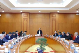 Politburo member and Standing Member of the Party Central Committee’s Secretariat Tran Cam Tu chairs a working session with the Party Central Committee Office and relevant agencies to review preparations for the 14th National Party Congress. (Photo: VNA)