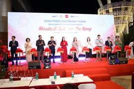 Da Nang city leaders and delegates at the ceremony to inaugurate two new international flight routes from Manila and Bali to Da Nang. (Photo: VNA)