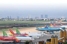 Fuel surcharge adjustments are seen as a short-term solution to cope with cost volatility. (Photo: VNA)