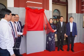 Delegates perform the ceremony to officially declare Hue Railway Station a tourist destination (Photo: VNA)