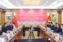 Delegates at the talks. (Photo: VNA)
