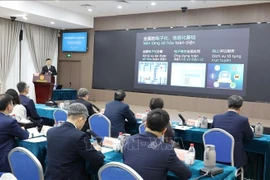 The Vietnamese delegation learn about the smart court model (using AI to support trials) at the Shenzhen Intermediate People's Court (SIPC), Guangdong province, China (Photo: VNA)