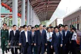 Party General Secretary To Lam, Prime Minister Pham Minh Chinh and other officials inspect the Dong Dang railway station on March 19. (Photo: VNA)