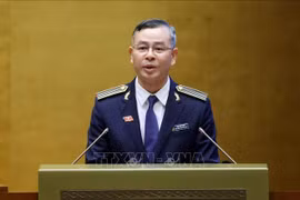 Auditor General Ngo Van Tuan delivers a report on the performance of the State Audit Office of Vietnam during the 2021–2026 tenure. (Photo: VNA)