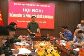 Deputy PM Tran Hong Ha speaks at the teleconference (Photo: VNA)