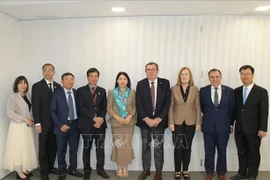 Leaders of the State Audit Office of Vietnam and the Public Audit Office of Catalonia (Spain) at the working session. (Photo published by VNA)