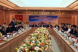At the theoretical exchange between the CPV and JCP on August 2. (Photo: VNA)