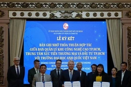 Signing ceremony of cooperation agreement to build an international-standard High-Tech Skills Training Centre in HCM City on February 12. (Photo: VNS)