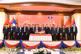 Delegates at the ministerial-level bilateral conference between the Ministries of Public Security of Vietnam and Laos on December 6, 2025 (Photo: VNA)
