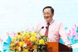 General Director of the Vietnam Bank for Social Policies, Duong Quyet Thang presides over the conference. (Photo: Vietnam+)