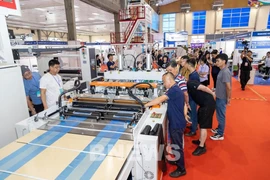Visitors at the 23rd International Exhibition on Machinery and Equipment for the Plastics and Rubber Industry - VietnamPlas 2025 (Photo: VNA)