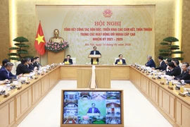 Prime Minister Pham Minh Chinh chairs a conference on January 14 to review the follow-up and implementation of the international agreements and commitments in 2021 - 2025 (Photo: VNA)