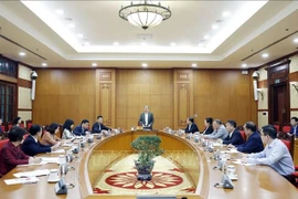 An overview of the working session on the enforcement of Party and State’s policies and guidelines for persons with disabilities in Hanoi on December 3 (Photo: VNA)