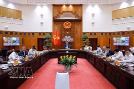 At the meeting of standing Government members on March 18, 2026 (Photo: VNA)