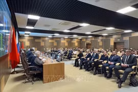Participants at the meeting (Photo: VNA)