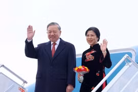 Party General Secretary To Lam and his spouse (Photo: VNA)