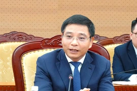 Minister of Finance Nguyen Van Thang speaks at the meeting (Photo: VNA)