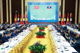 The 48th meeting of the Vietnam – Laos Inter-Governmental Committee is co-chaired by Prime Minister Pham Minh Chinh and his Lao counterpart Sonexay Siphandone on December 3. (Photo: VNA)