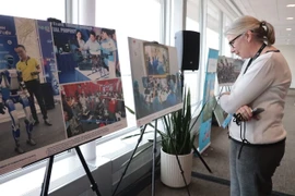A visitor to the exhibition. (Photo: VNA)