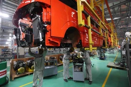 An auto assembly line at Kim Long Motor Hue in the Chân May - Lang Co Economic Zone in the central city of Hue. (Photo: VNA)