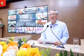 Permanent Deputy Prime Minister Nguyen Hoa Binh speaks at the conference. (Photo: VNA)