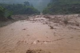 Heavy rain caused flooding over the road at Km 1 + 520 on the provincial road No.140 in Dien Bien, July 31, 2025. (Photo: VNA)