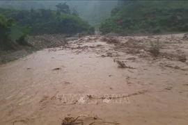 Heavy rain caused flooding over the road at Km 1 + 520 on the provincial road No.140 in Dien Bien, July 31, 2025. (Photo: VNA)