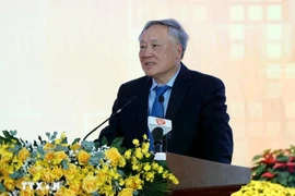 Permanent Deputy Prime Minister Nguyen Hoa Binh speaks at the workshop. (Photo: VNA)