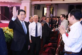 State President Luong Cuong (L) attends the ceremony marking the 80th Traditional Day of Vietnamese Lawyers (October 10, 1945 – 2025) held by the Vietnam Bar Federation in Hanoi on October 9 evening. (Photo: VNA)