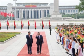 General Secretary of the Communist Party of China Central Committee and President of China Xi Jinping and his spouse preside over the welcoming ceremony for General Secretary of the Communist Party of Vietnam Central Committee and President To Lam and his spouse on a state visit to China from August 18 - 20, 2024. (Photo: VNA)