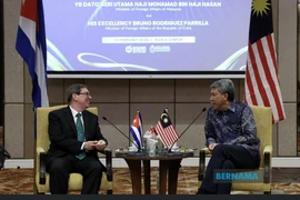 Malaysian Foreign Minister Seri Mohamad Hasan (right) and his Cuban counterpart Bruno Eduardo Rodriguez Parrilla in Kuala Lumpur on February 13. (Photo: Bernama)