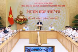 PM Pham Minh Chinh speaks at the meeting. (Photo: VNA)