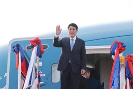 State President Luong Cuong at Wattay International Airport in Vientiane, Laos. (Photo: VNA)