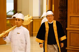 U Aung Lin Dwe (R), speaker of Myanmar's Union Parliament and speaker of Amyotha Hluttaw (Upper House), leaves after the second day meeting of the first regular session of the Union Parliament in Nay Pyi Taw, Myanmar, April 2, 2026. (Photo: Xinhua)