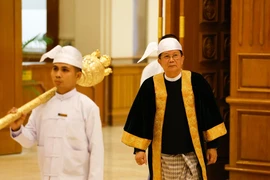 U Aung Lin Dwe (R), speaker of Myanmar's Union Parliament and speaker of Amyotha Hluttaw (Upper House), leaves after the second day meeting of the first regular session of the Union Parliament in Nay Pyi Taw, Myanmar, April 2, 2026. (Photo: Xinhua)