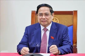 Prime Minister Pham Minh Chinh during phone talks with Alexey Likhachev, Director General of Russia’s State Atomic Energy Corporation (Rosatom). (Photo: VNA