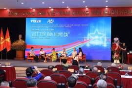 At the hybrid seminar (Photo: VNA)