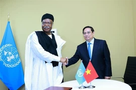 PM Pham Minh Chinh (R) and President of the UN General Assembly Philemon Yang (Photo: VNA)