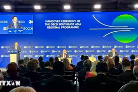 Finance Minister Nguyen Van Thang addresses the OECD leadership hand-over ceremony at the OECD Ministerial Council Meeting (MCM) 2025. (Photo: VNA)