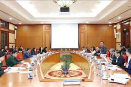 The meeting of the organising subcommittee for the 14th National Party Congress on November 18 reviews preparations for the coming event. (Photo: VNA)