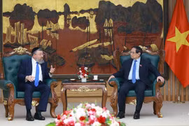 Prime Minister Pham Minh Chinh and Israeli Minister of Labour Rabbi Yoav Ben Tzur at their meeting in Hanoi on May 21. (Photo: VNA)