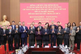 President of the Vietnam Fatherland Front (VFF) Central Committee Bui Thi Minh Hoai (front, seventh from left) and delegates to the 13th Vietnam–China People’s Forum poses for a group photo at their meeting in Hanoi on November 25. (Photo: VNA)