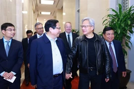 PM Pham Minh Chinh and CEO of Nvidia Corporation Jensen Huang (Photo: VNA)