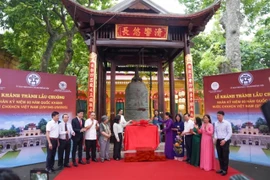 The Hà Nội Handicraft and Village Association officially handed over the restored structure to the Thang Long – Hanoi Heritage Conservation Centre. (Photo: cand.com.vn) 