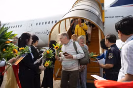 The ceremony welcoming the 20 millionth international tourist to Vietnam at Phu Quoc International Airport in December. (Photo: VNA)