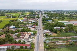 National Highway 22B, the main route connecting Ho Chi Minh City with Moc Bai International Border Gate, Tay Ninh Province, has not met transportation needs. The Ho Chi Minh City - Moc Bai Expressway is expected to reduce transportation pressure. (Photo: VNA) 